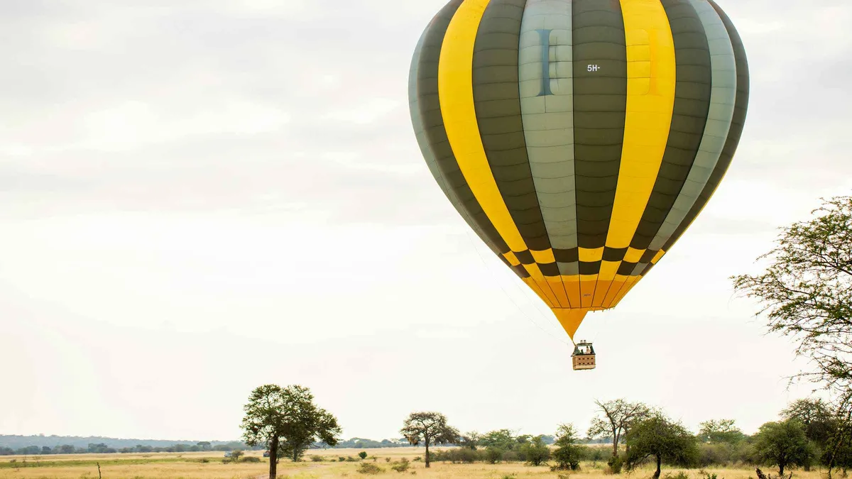 Hot air balloon over the plains on a Serengeti safari package with a Ngorongoro Crater game drive, Tanzania